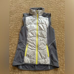 Eddie Bauer Women’s Polar Tech Vest. Gray with yellow trim. Size small.